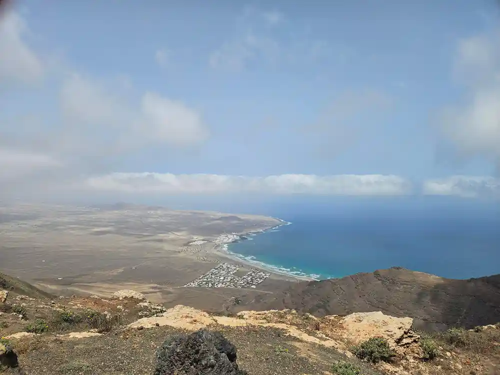 Aerial view of coastal settlement and turquoise ocean