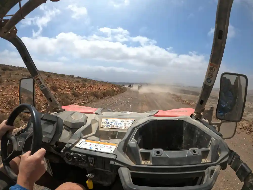 Front view of buggy on unpaved desert road