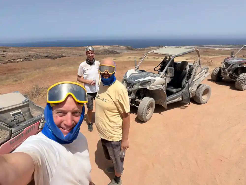 Group of people with buggies on sandy plateau