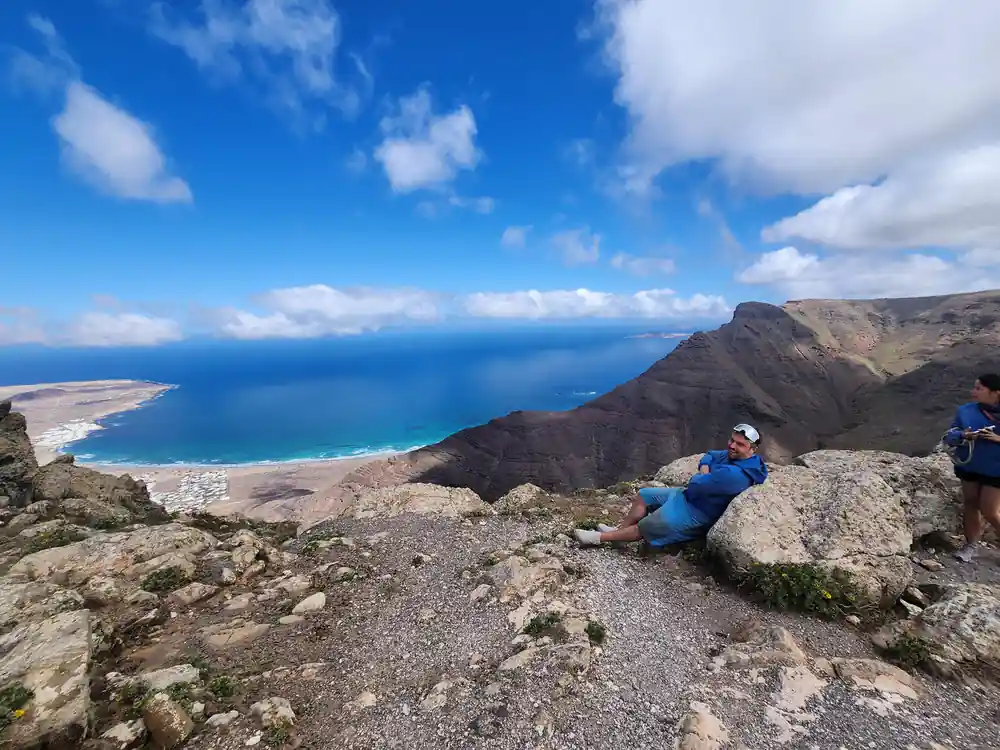 High coastal cliffs with turquoise sea and beach below