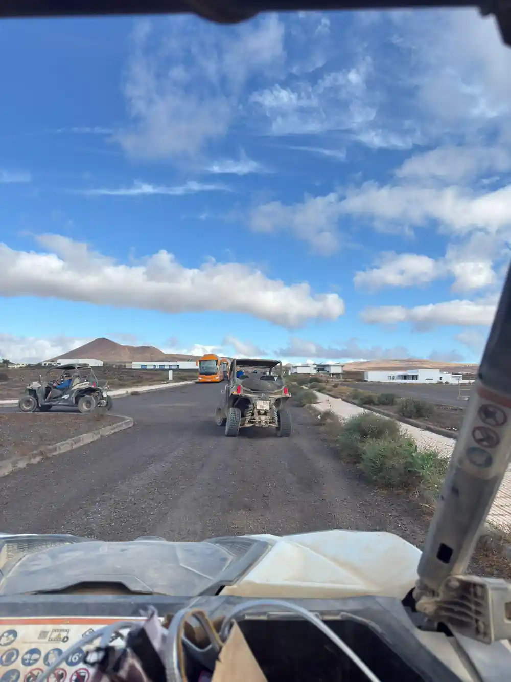 Quad bike on tarmac road in industrial area
